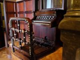 View of the old family organ console from the central hall
