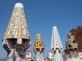 Signature Gaudi chimney sculptures on palace roof