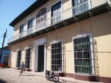 Denise outside a typical Town colonial building