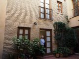 Denise at our room courtyard entrance